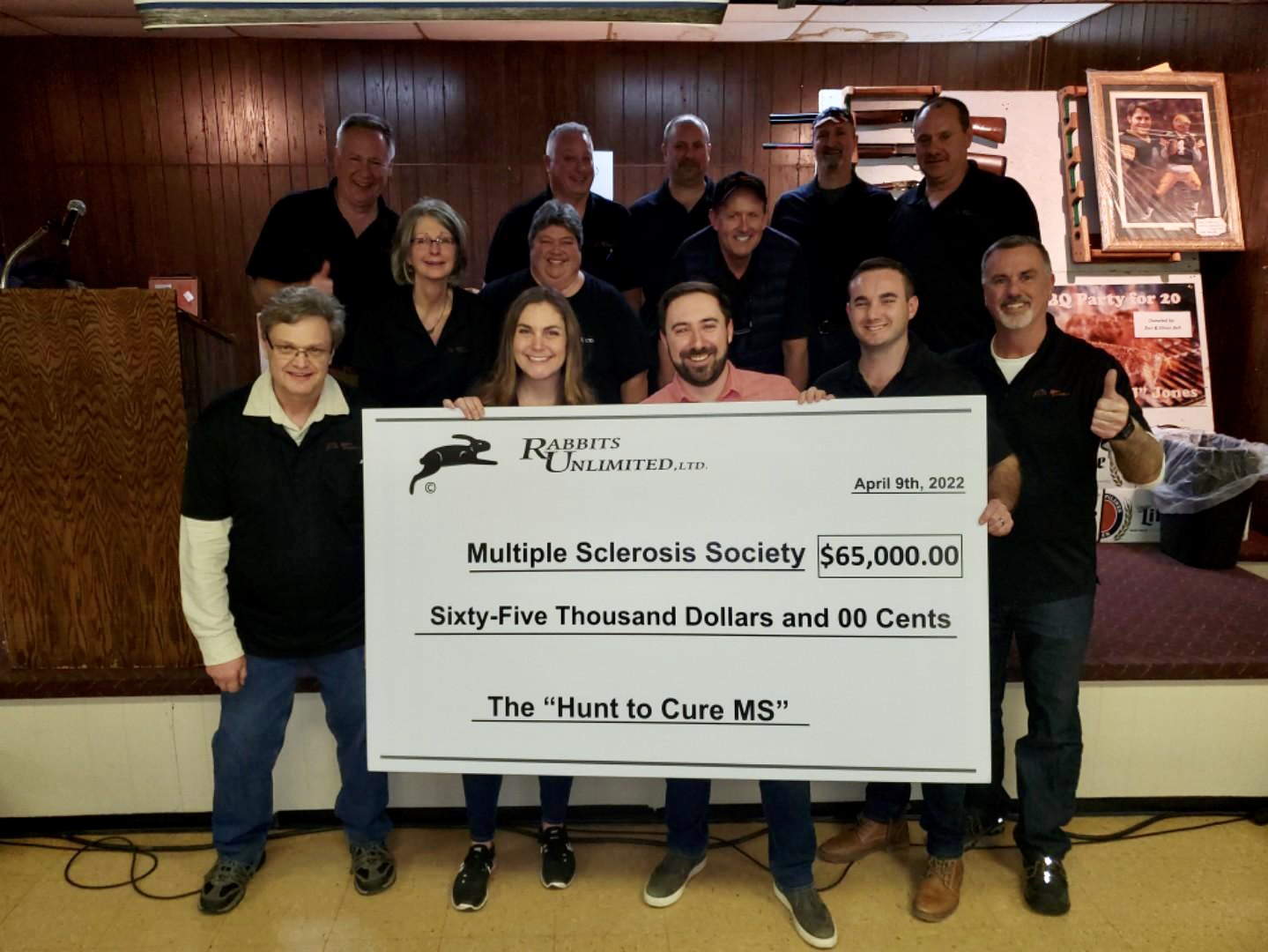 Rabbits Unlimited volunteers presenting a $65,000 donation to the National MS Society